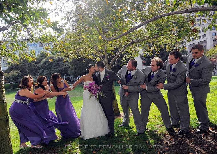 bridesmaids and grromsmen in bridal party ensemble pose for fun photo by san francisco wedding photographer