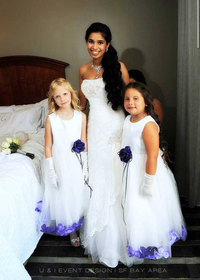 photo of bride with her flower girls at event by san francisco wedding planner