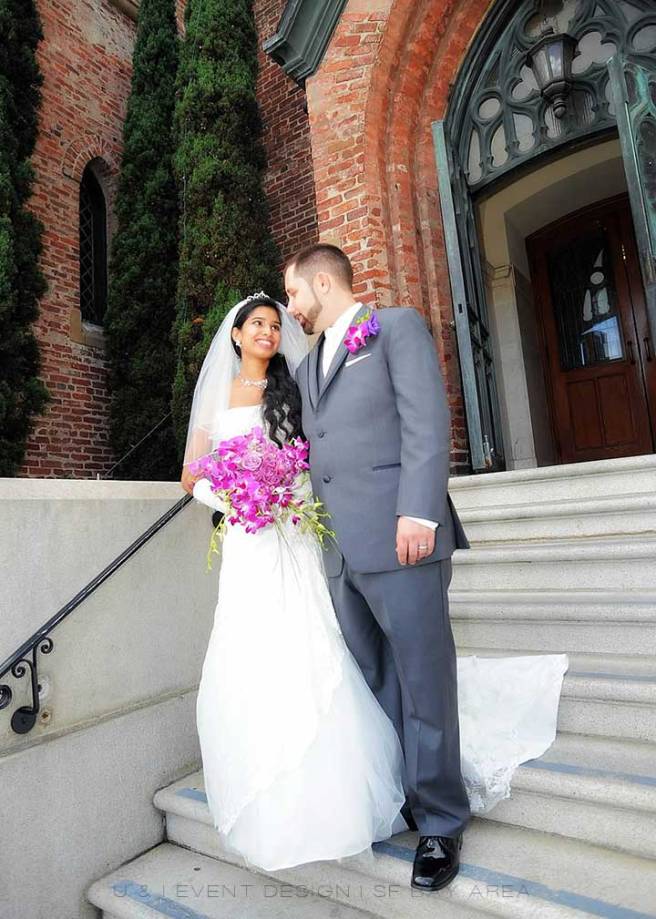 bride and groom pose for photo with bouquet by east bay area wedding florist