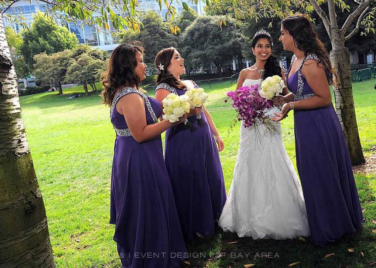 bride and bridesmaids in beautiful dresses holding flowers by Oakland bay area wedding florist